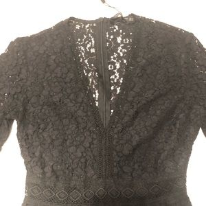 Zara black crochet lace plunge dress. Elbow length graduating bell sleeves XS